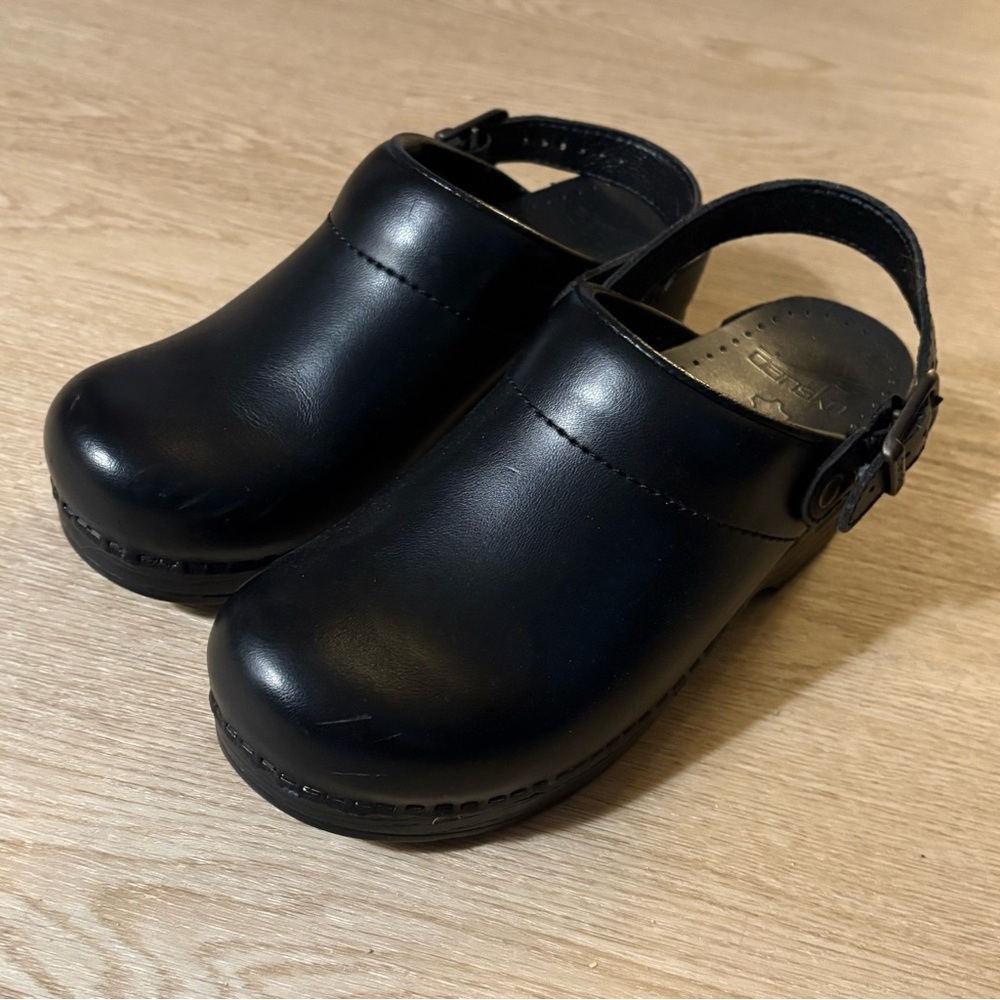Dansko Black Slip-On Leather Clogs with Heel Strap